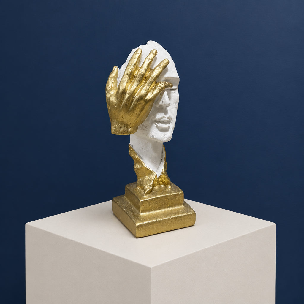 White and Gold Hand on Face Sculpture